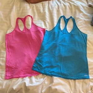 Pink and blue Under armour tank tops, M